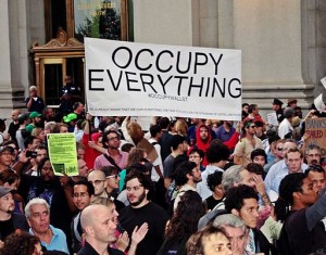 "Occupy EVerything" sign
